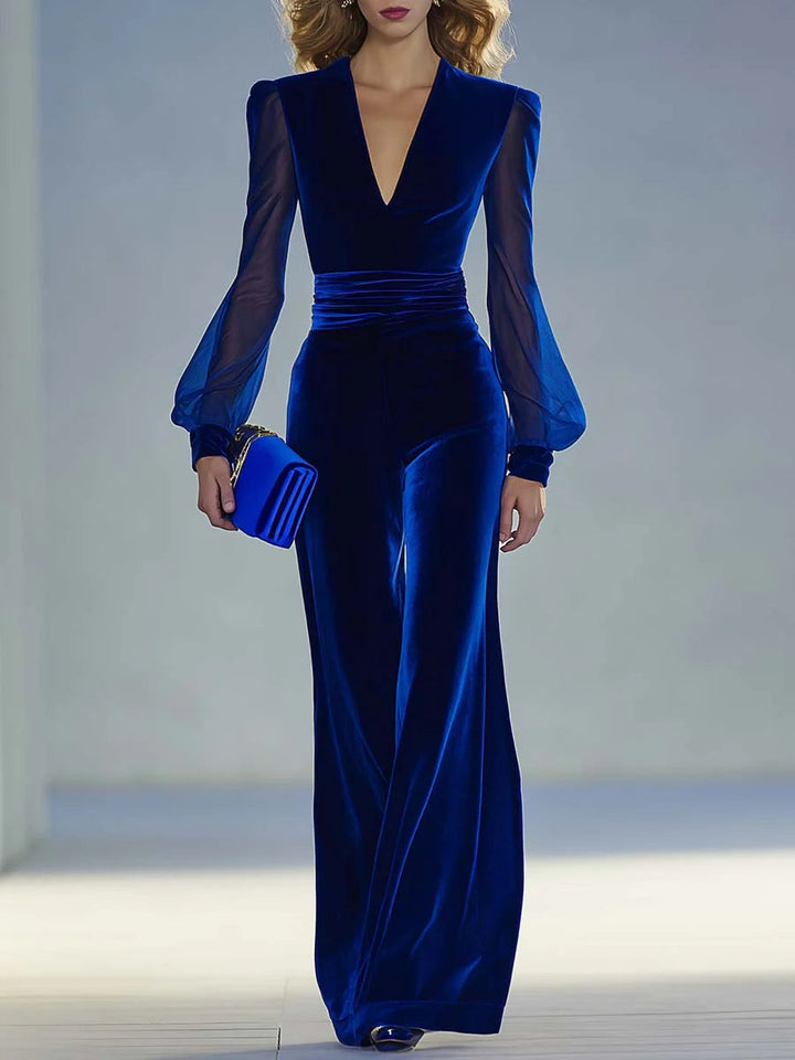 VELVET JUMPSUIT WITH V-NECK AND SHEER SLEEVES
